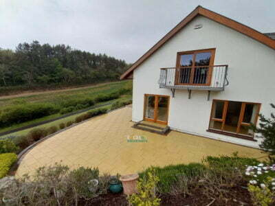 Patio with Gold Granite Slabs and Red Paved Border in Sandycove, Co. Cork