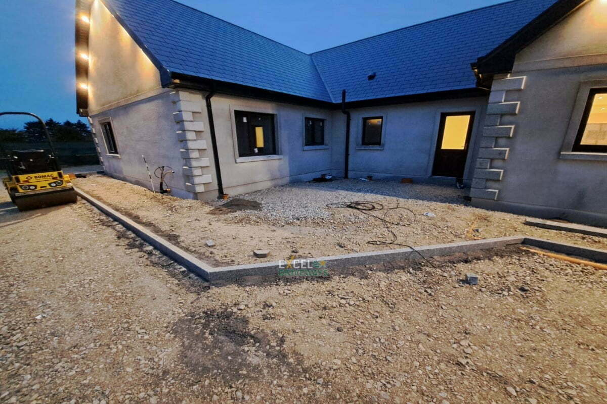 Driveway and Patio with Kilsaran Slate Paving and Lismore Granite Setts