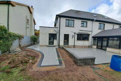 Patio with Silver Granite Slabs Charcoal Border and Connemara Walling in Glanmire Co. Cork 5