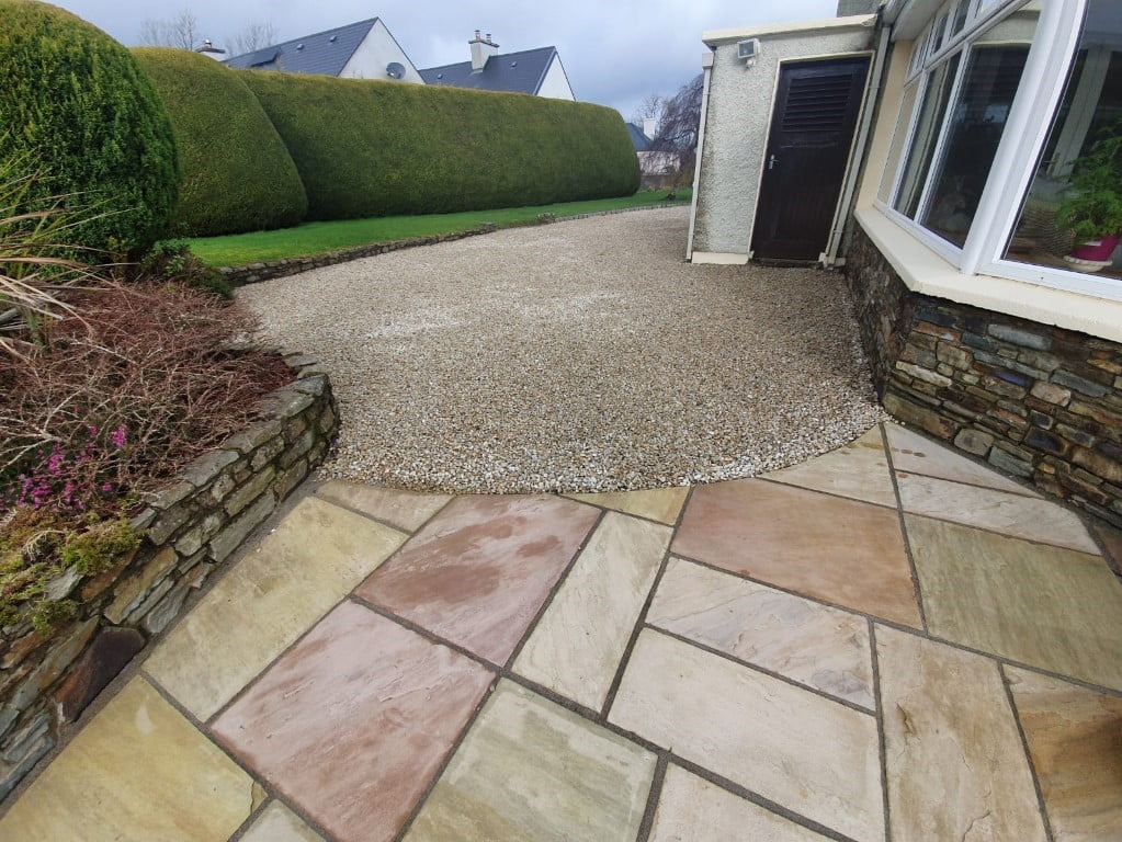 Golden Gravel Driveway with Sandstone Patio in Milstreet Excel