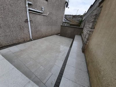 Granite Patio with Raised Seating Area in Douglas Cork