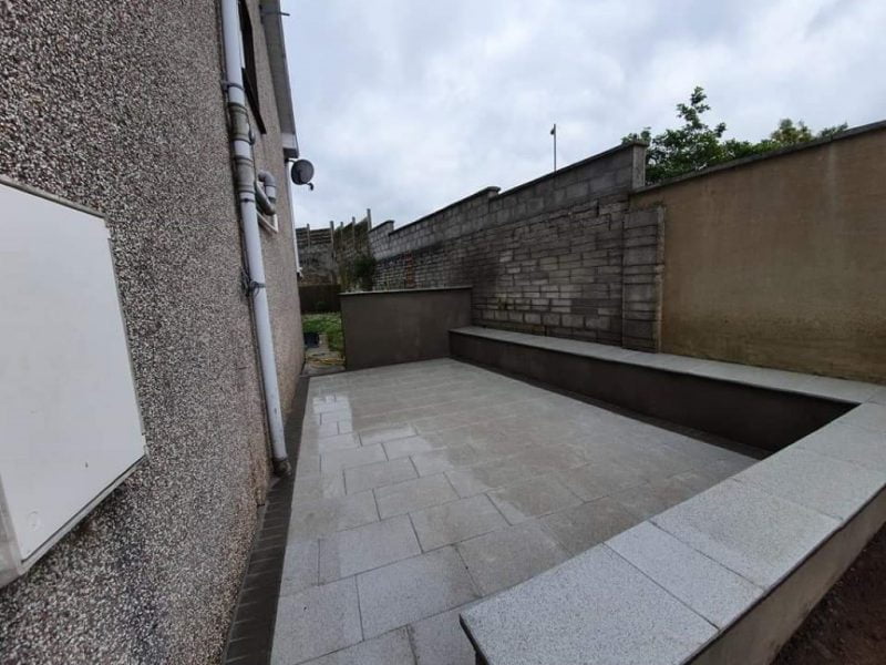 Granite Patio with Raised Seating Area in Douglas Cork