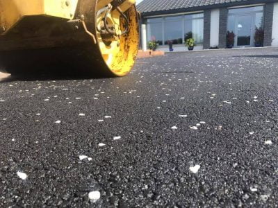 Rolling in white chippings on tarmac in Bantry